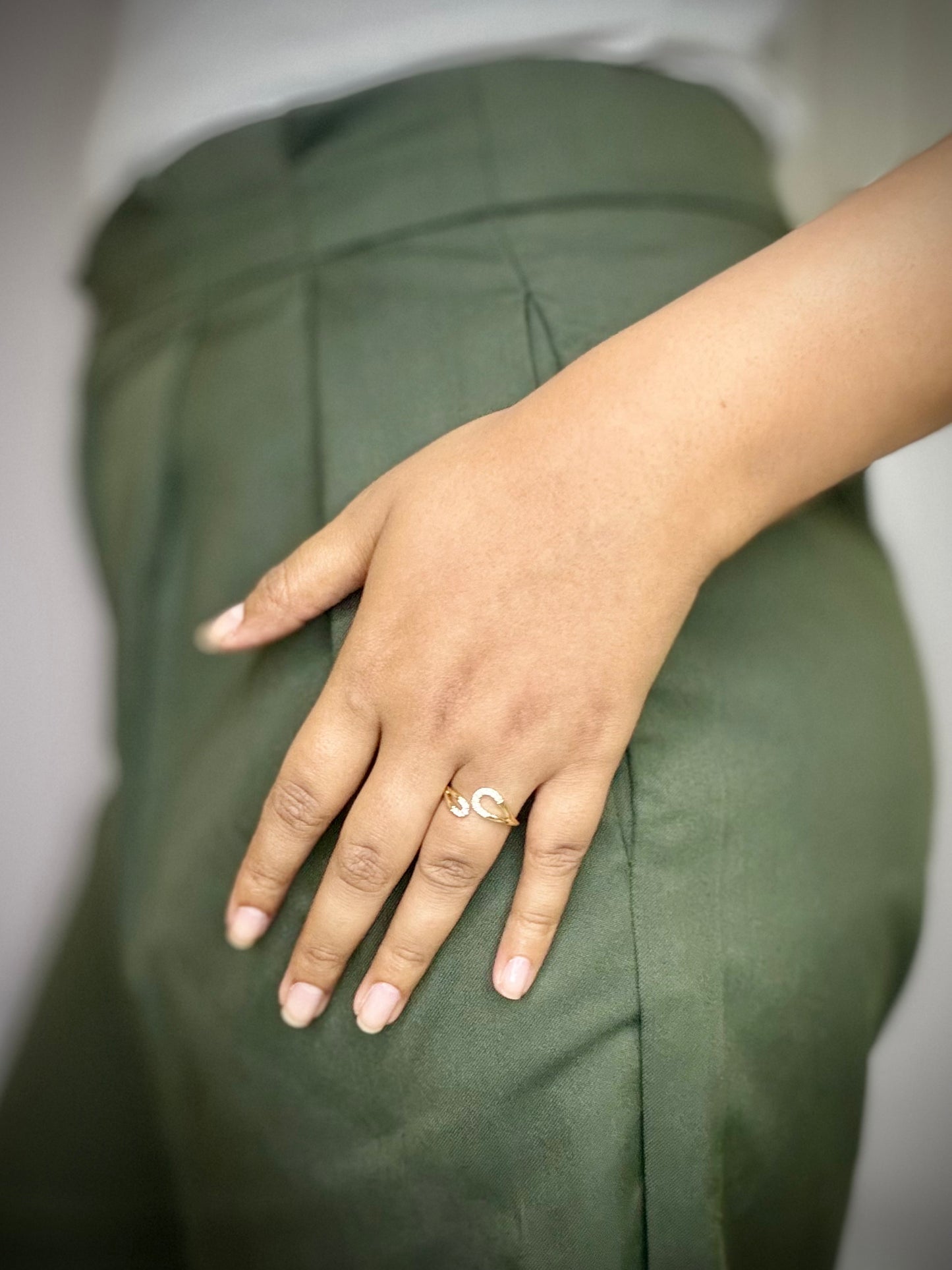 Gold tone anti-tarnish ring with sparkling stones