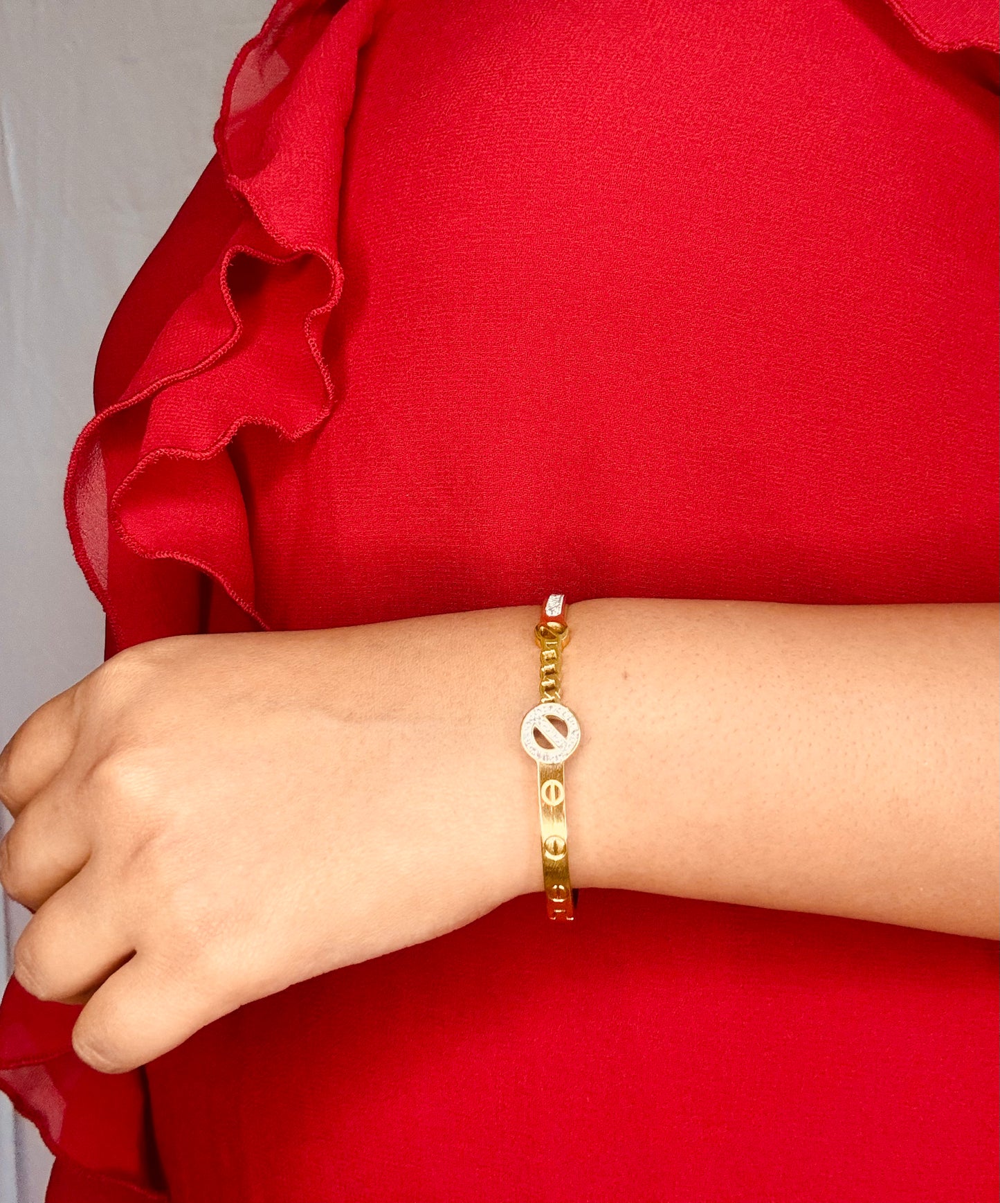Sleek Gold Tone Bracelet